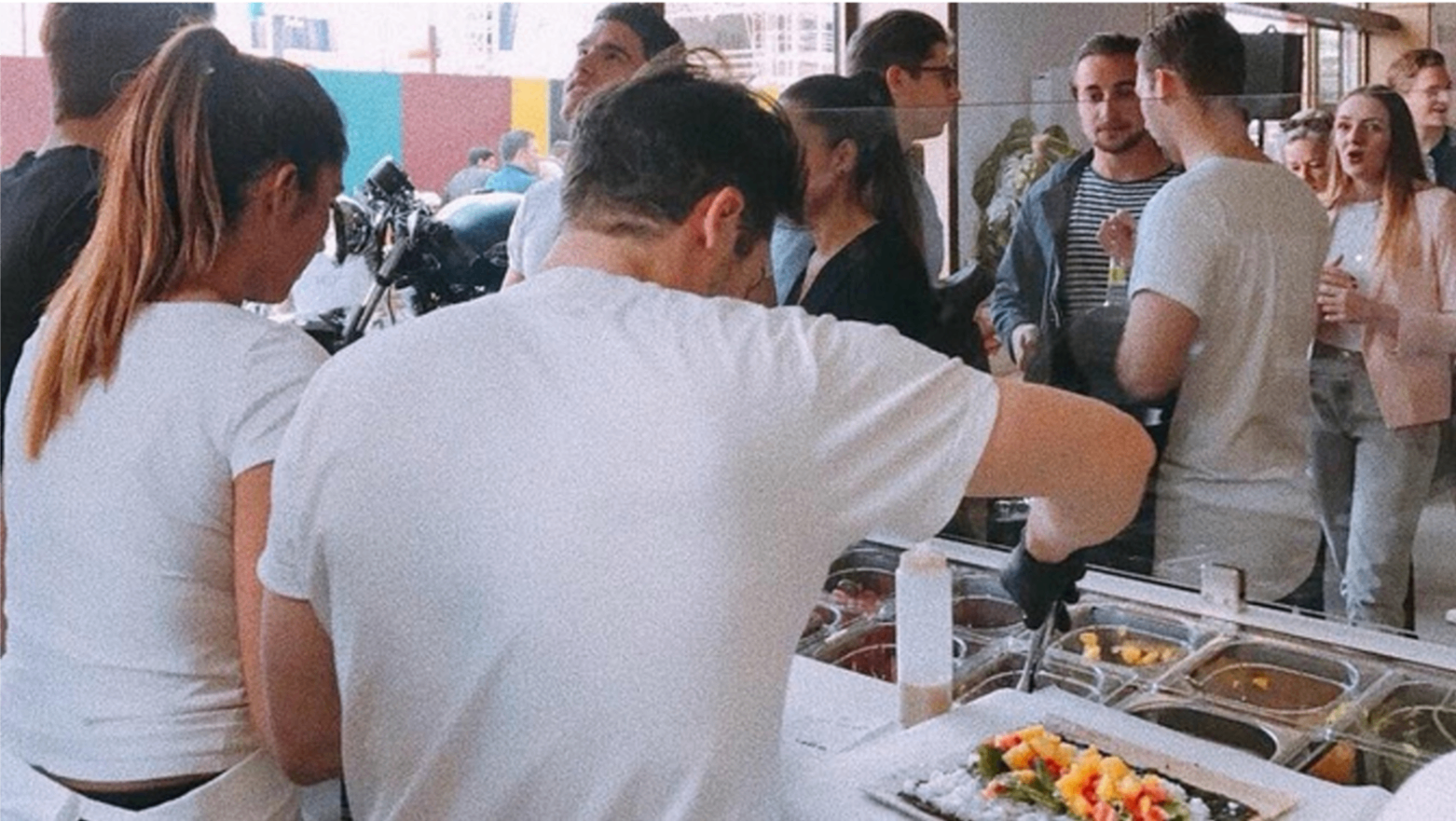 Serving guests at the first kaisin. pop-up